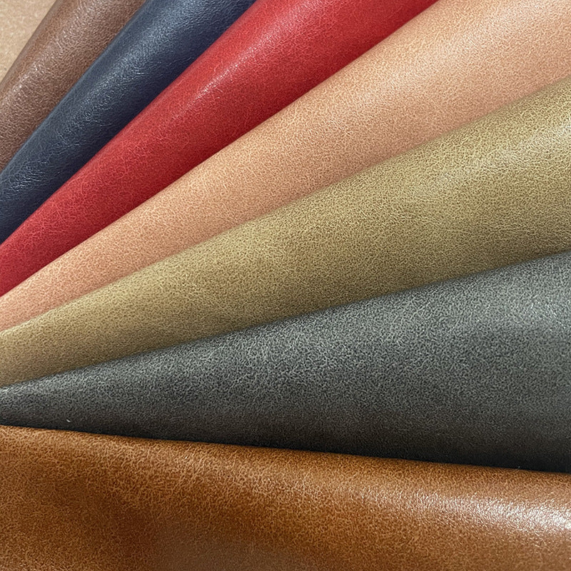 Hot pressed color changing PU leather 0.6mm mad cowhide notebook leather cover artificial leather handbag luggage pressure changing leather